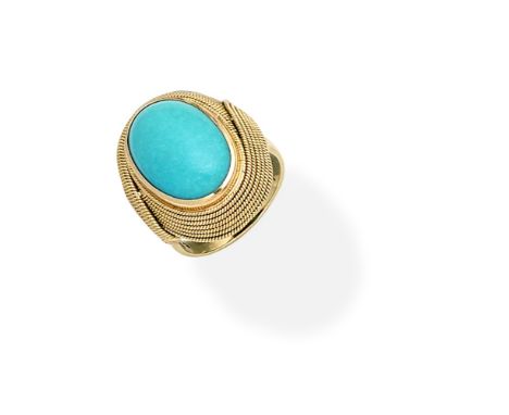 TURQUOISE DRESS RINGThe oval turquoise cabochon set within a surround of ropetwist design, ring size PFor further information