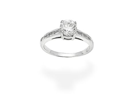 DIAMOND SINGLE-STONE RINGThe brilliant-cut diamond, between baguette-cut diamond shoulders,  principal diamond approx. 0.75ct