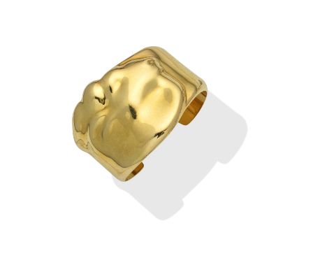 ELSA PERETTI FOR TIFFANY: ZODIAC BANGLE, CIRCA 1982The torque cuff bangle, depicting the Capricorn zodiac sign,  signed Peret