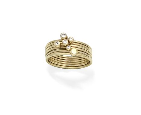 WENDY RAMSHAW: SIX DIAMOND-SET STACKING RINGS, 1997Five rings set with brilliant-cut diamonds, mounted in 18 carat gold, make