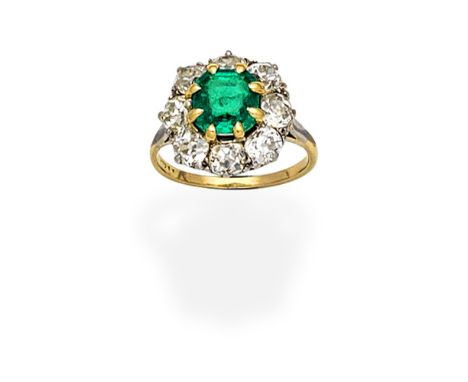 EMERALD AND DIAMOND CLUSTER RINGThe octagonal-cut emerald within a cushion-shaped diamond surround, diamonds approx. 1.60cts 