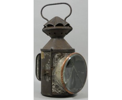 A N.E.R. four aspect hand held lamp, with glasses and burner, front glass A/F. 