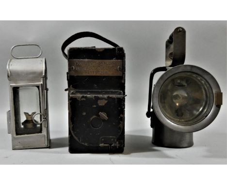 A portable electric signalling lantern, a small silver LNER hand lantern, with burner and another hand lamp (3). 