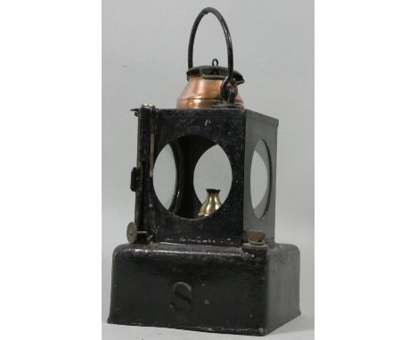 A L.N.E.R. black painted signal lamp, embossed letters, with burner. 