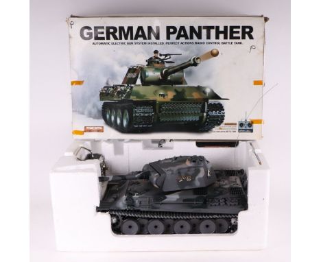 A 1/16 scale radio control German Panther Tank, boxed; together with a 1/16 US Military Truck with remote control, boxed (2).