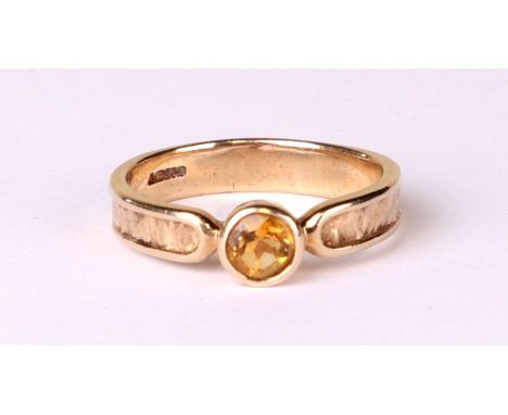 A 9ct gold citrine dress ring, approx UK size 'K', 3.5g.