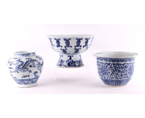 A large Chinese blue &amp; white stem bowl, 20cms diameter; together with a blue &amp; white baluster vase decorated with a d