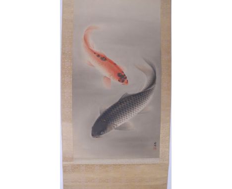 A Chinese scroll painting depicting koi carp with two character signature lower right, 54 by 135cms.