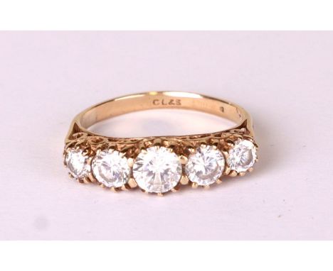 A 9ct gold and five white stone ring, approx UK size 'K', 2.5g.