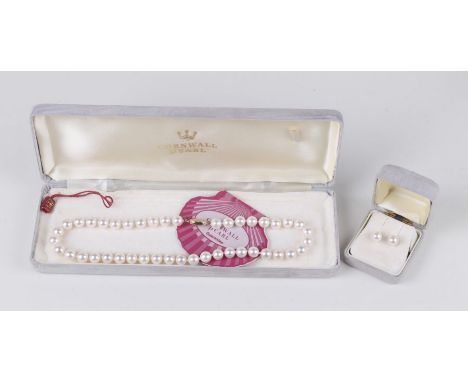 A faux pearl necklace with 9ct gold clasp; together with a matching pair of stud earrings.