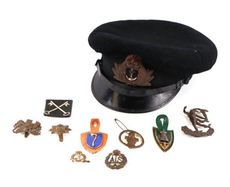A quantity of assorted military cap badges to include Royal Corp of Signals' Royal Army Service Corp, other similar cap badge