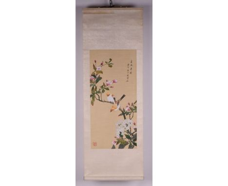 A Chinese scroll painting depicting birds amongst flowering foliage and calligraphy, 29 by 63cms.