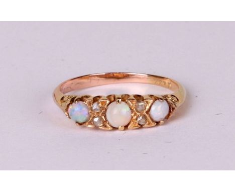 A yellow metal opal and diamond ring, approx UK size 'L', 2.9g.