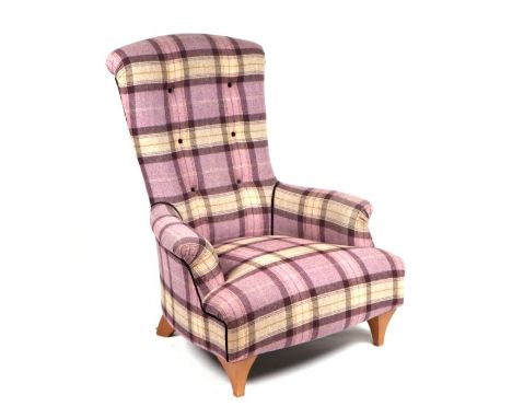 A John Sankey button backed armchair upholstered in tartan design fabric.Condition ReportIn good overall condition.