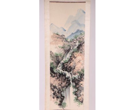 A Chinese scroll painting depicting a waterfall scene, 30 by 94cms.