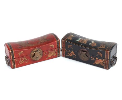 A Chinese lacquer pillow box decorated with young boys playing, 28cms wide; together with another similar decorated with a dr