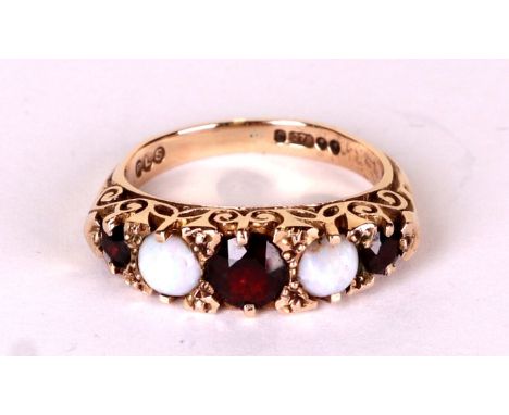  A Victorian 9ct gold garnet and opal half hoop ring, approx UK size 'L', 4.2g.