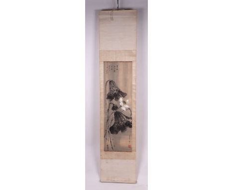 A Chinese scroll painting depicting flowers and calligraphy, 30 by 94cms.