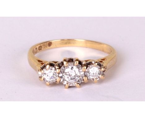 An 18ct gold three-stone diamond ring, approx UK size 'K', 2.9g.