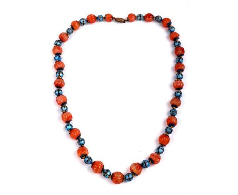 A Chinese carnelian and enamelled silver bead necklace with a silver gilt clasp, 75cms long.Condition ReportBeads approx 15mm