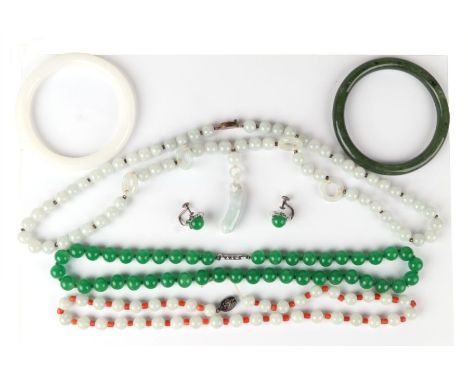 A Chinese pale jade / hardstone pendant drop necklace with silver gilt clasp; together with similar necklaces; a pair of scre