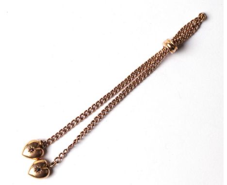 A Victorian 15ct gold bracelet with heart shaped terminals set with a sapphire and a ruby, 8.8g.Condition ReportThe item is c