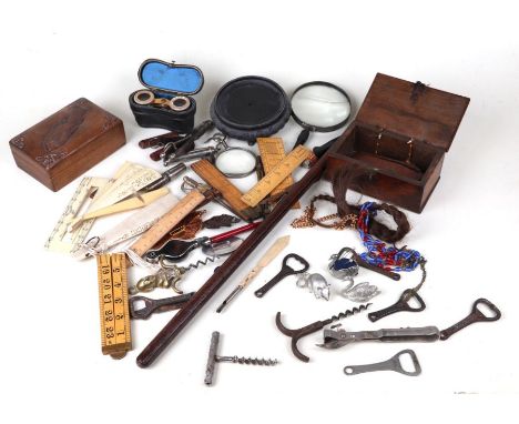 A quantity of assorted collector's items to include wooden draughtsman's rulers, a leather measure, mother of pearl opera gla