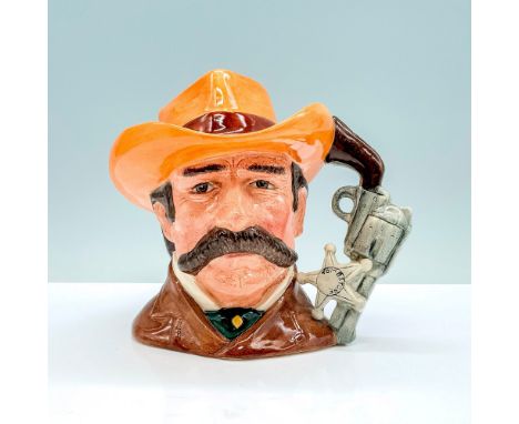 Brown coat; light brown hat with red band.Royal Doulton backstamp. Artist: Stanley J. TaylorIssued: 1985 - 1989Dimensions: 5.