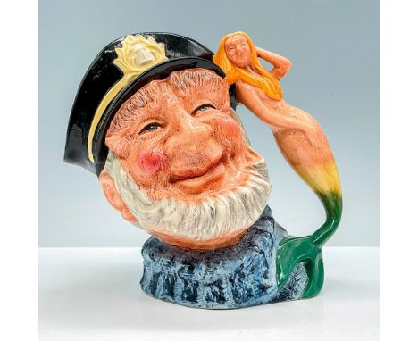 Features the depiction of an old, bearded ship's captain. New colourway with light blue over dark blue fisherman's jersey and