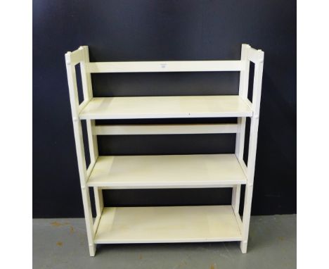 A folding three tier white painted pine shelf unit, 90 x 73cm