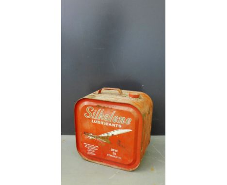 A vintage Silkolene red painted oil canister, 36 x 36cm 