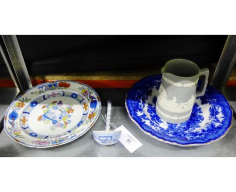 A mixed lot to include a Staffordshire blue and white ladle, a Masons plate, a Dudson style jug and a blue and white bowl (4)