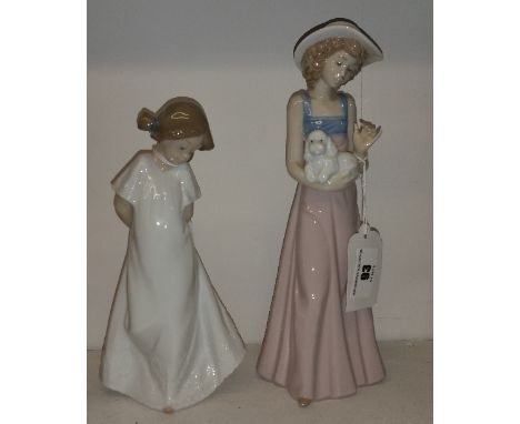 Two Nao Figures of Girls, the tallest 25.5cm.