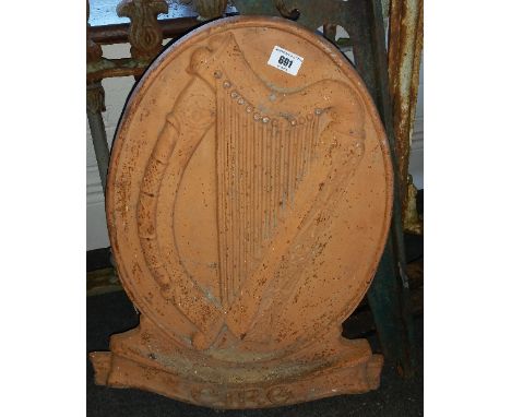 A Cast Plaque as Used by the Irish Government. A cast metal plaque with the harp emblem of the state. As used on exteriors of