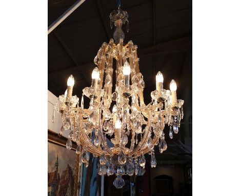 A Superb Crystal and Glass Chandelier of Large Size.