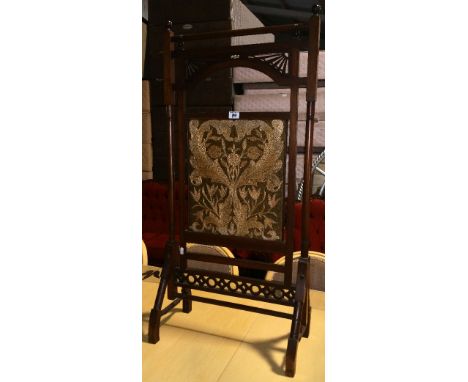 An Attractive Late 19th Century Mahogany Firescreen with tapestry panel.