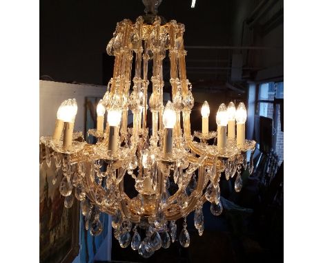 A Superb Crystal and Glass Chandelier of Large Size.