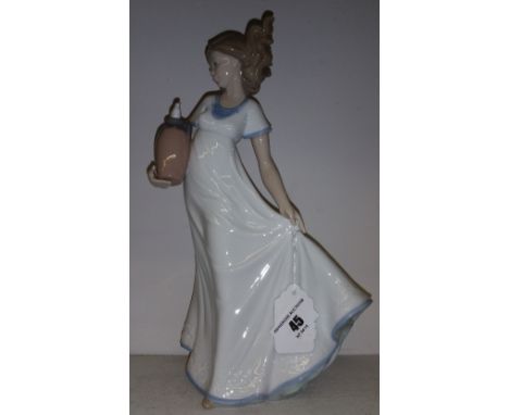 A Large Nao Figure of a Girl with an Urn.