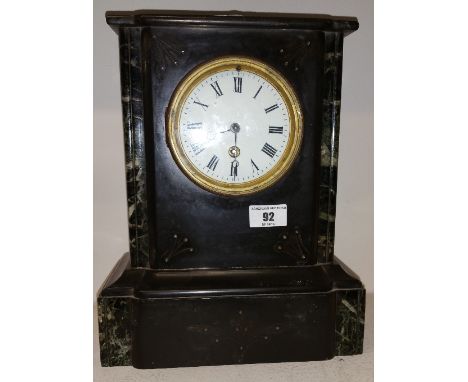 A Single Train Black Mantel Clock with Marble Columns; the white enamel face with Roman numerals. 30cm (h) x 24.5cm (w).