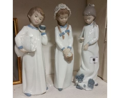 Three Nao Figures of Children at Bedtime (two boxed). (3).