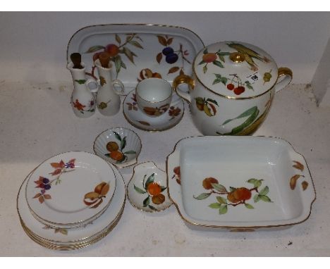 A Large Quantity of Royal Worcester Evesham Dinner; to include an oven dish, tall pot and lid, oil and vinegar, plates etc.
