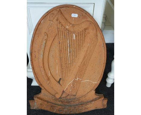 A Cast Plaque as Used by the Irish Government. A cast metal plaque with the harp emblem of the state. As used on exteriors of