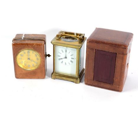 A Cosmos Brevette electric travel clock; and a carriage clock 