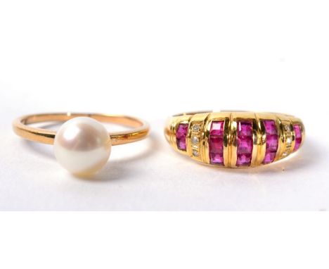 A ruby and diamond hoop ring, finger size L, stamped '585', 2.8g and a Mikimoto cultured pearl ring, finger size L, stamped w