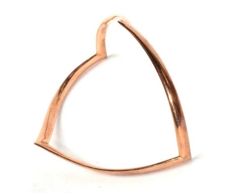A bangle stamped '9ct'