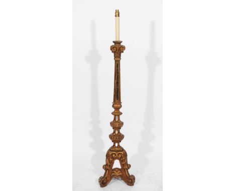 AN ITALIANATE GILT AND MIRRORED STANDARD LAMP of triform with scrolling acanthus decoration, 146cm high