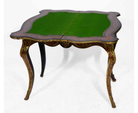 A FRENCH 'BOULLE' SIMULATED TORTOISESHELL AND BRASS INLAID SERPENTINE FOLD OVER CARD TABLE with green baize playing surface o