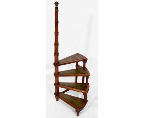A SET OF REPRODUCTION FOUR TREAD LIBRARY STEPS with gold tooled green leather tops and brass finial, 112cm high