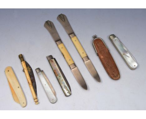 A COLLECTION OF EIGHT FRUIT KNIVES, three with silver blades including a patented knife and fork by J. Deakin & Sons, Sheffie