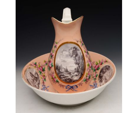 A 19TH CENTURY BLUSH GROUND PORCELAIN JUG AND BASIN decorated fishing scenes en grisaille within a ribbon swag cartouche, jug